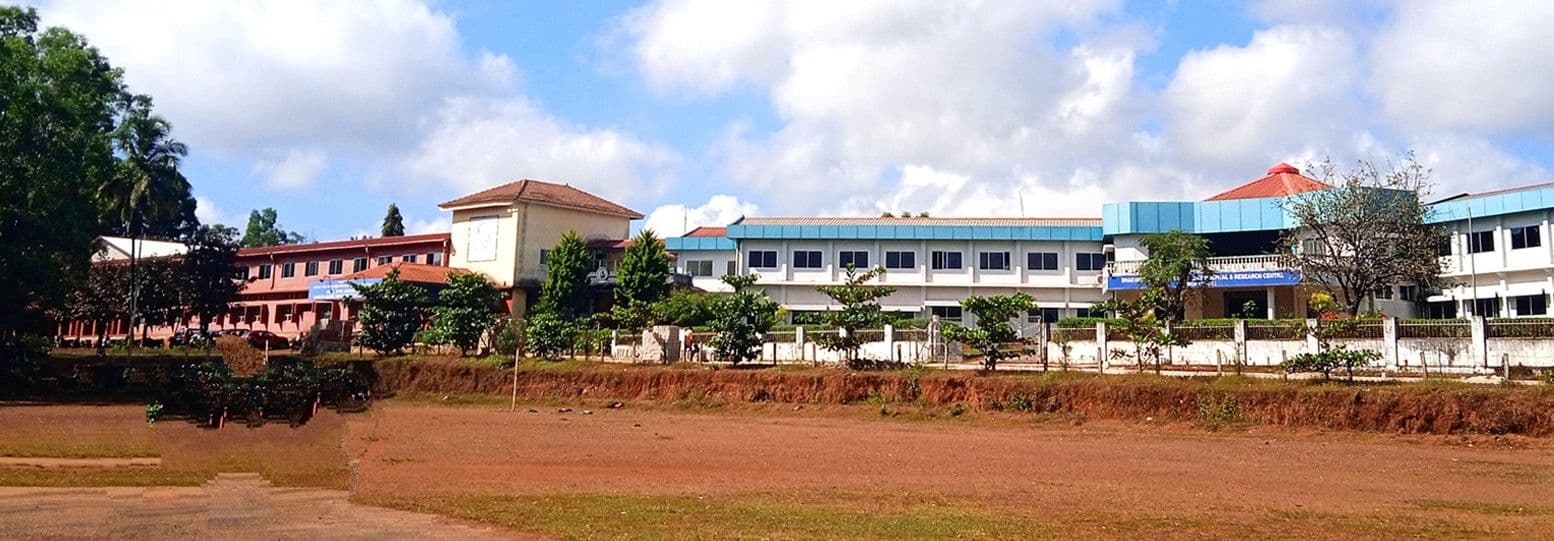 Dhanvantari Ayurveda College campus in Siddapur, surrounded by greenery